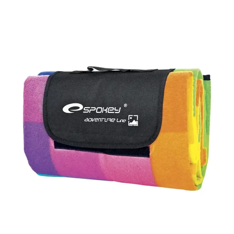 Foldable travel blanket with print on the carrying pouch