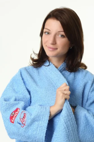 Close-up of quality machine embroidery on a structured bathrobe