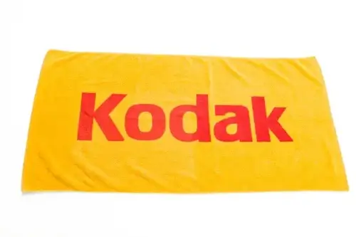 Yellow Kodak beach bath towel with all-over jacquard-woven pattern